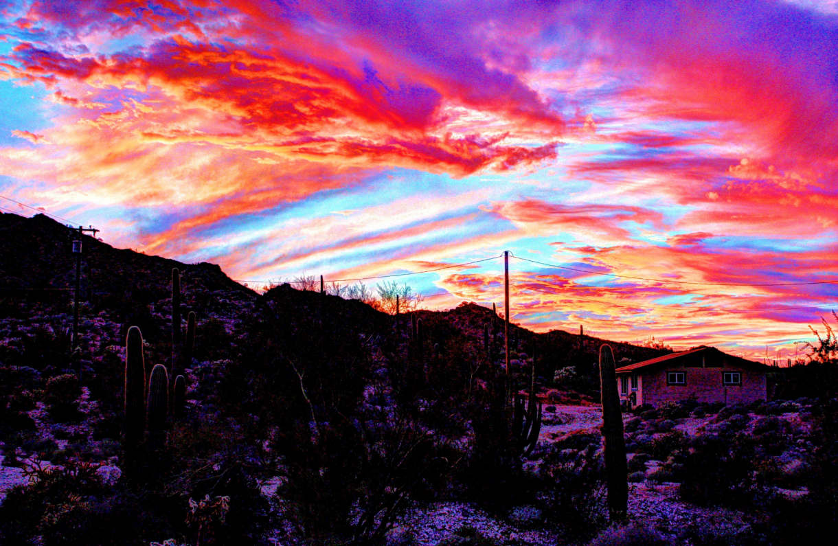 Lee Robinson 'Tracy’s Casita at Sunset' a brilliant sunset over Ajo